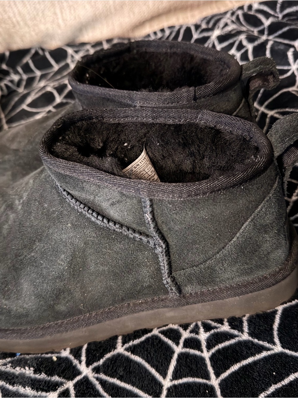 Women’s black Ugg boots size 9